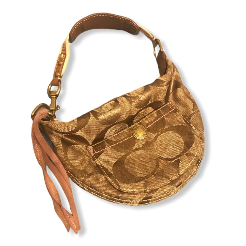 Coach purse small sized with tassel boho style